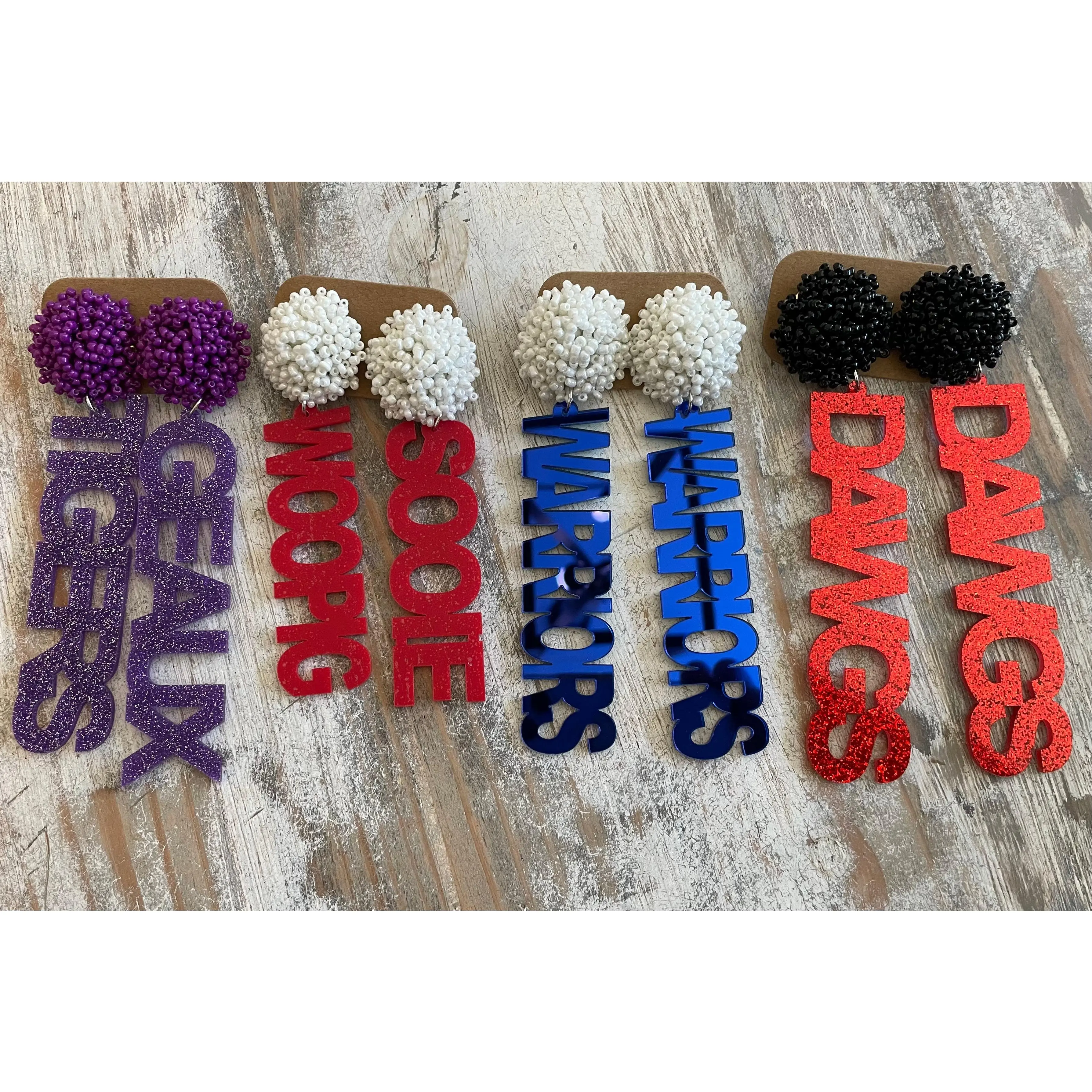 Team Pom Pom Earrings - No Additional Features or Specifications Provided