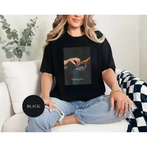 T-Shirt, Ariana Cynthia Finger Hold Defying Gravity Meme  Movie Gift Broadway Shirt