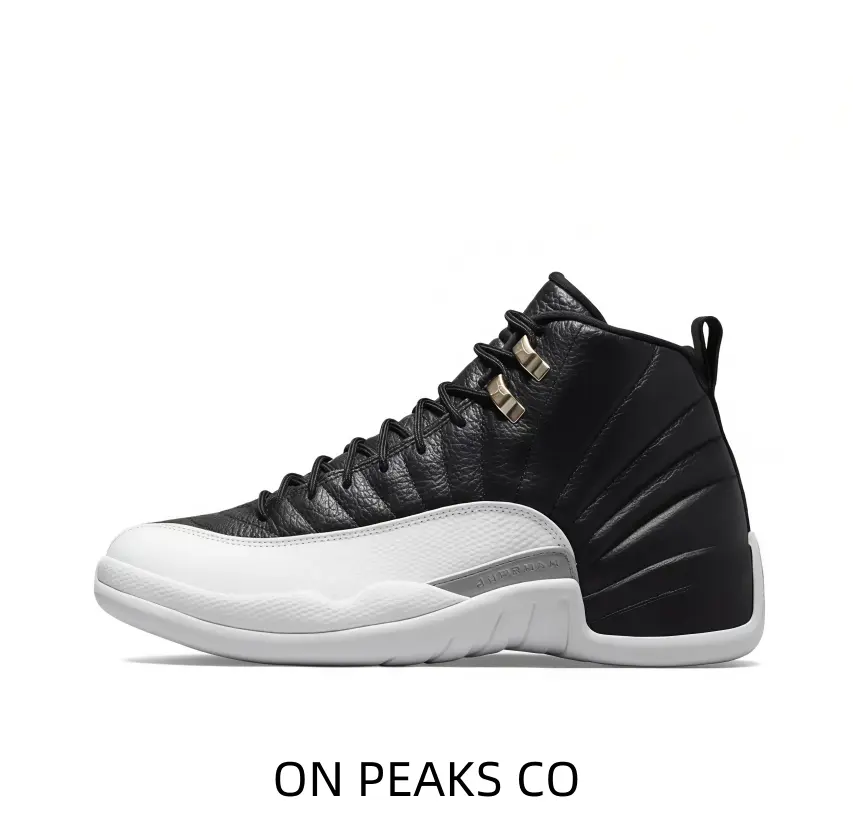 Thick black high-top ankle lining with neat edge piping, flat black woven shoelaces, classic two-tone black-white silhouette decorated with metallic gold hardware