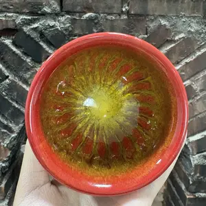 Fiery Red Jianzhan Cup Porcelain Handcrafted Artistic Tea Cup with Unique Color Gradient Sunflower Pattern for Tea Enthusiasts