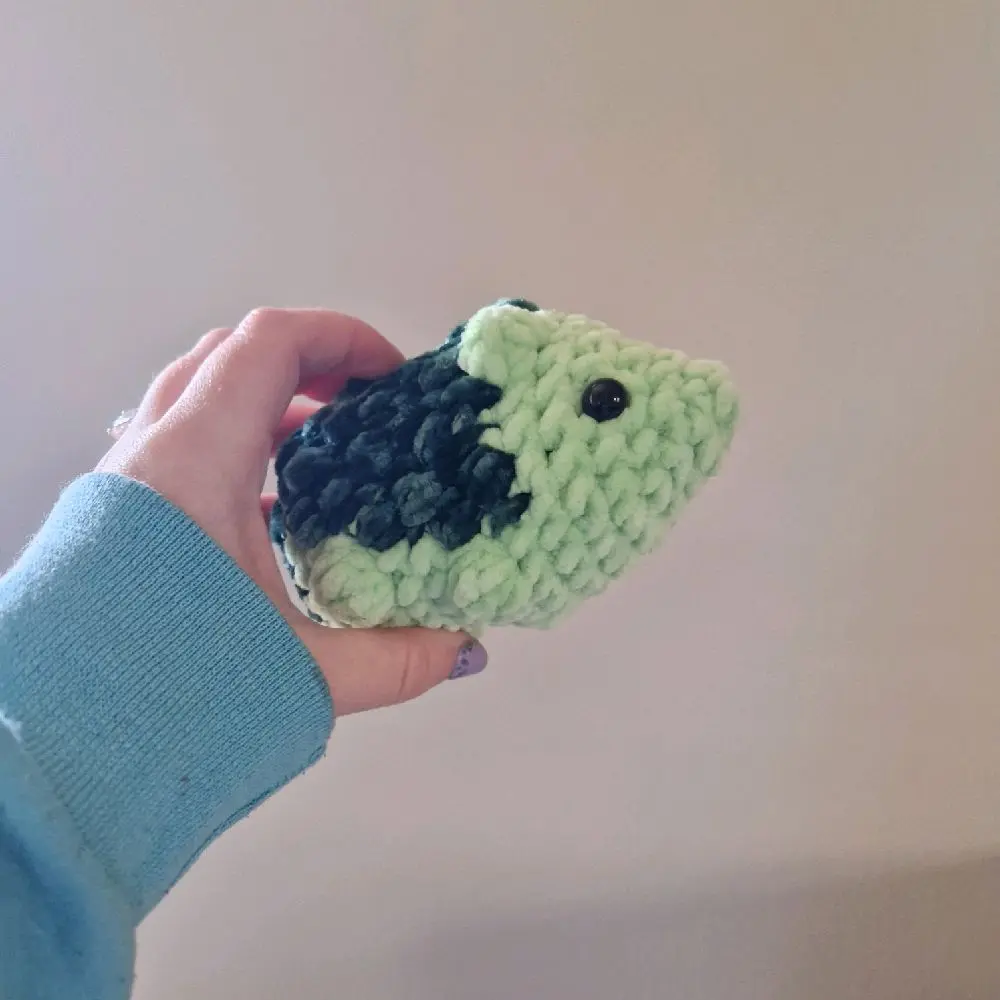 Green handmade plushie hedgehog crochet amigurumi