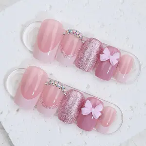 24PCS New Medium Square White French Tip Press on Nails with Bowknot Decor, Very Cute Nail Designs Suitable for Girls of All AgesComes with one sheet of jelly adhesive and one piece of sanding pad,nails kit set，nail tech supplies，nail kit