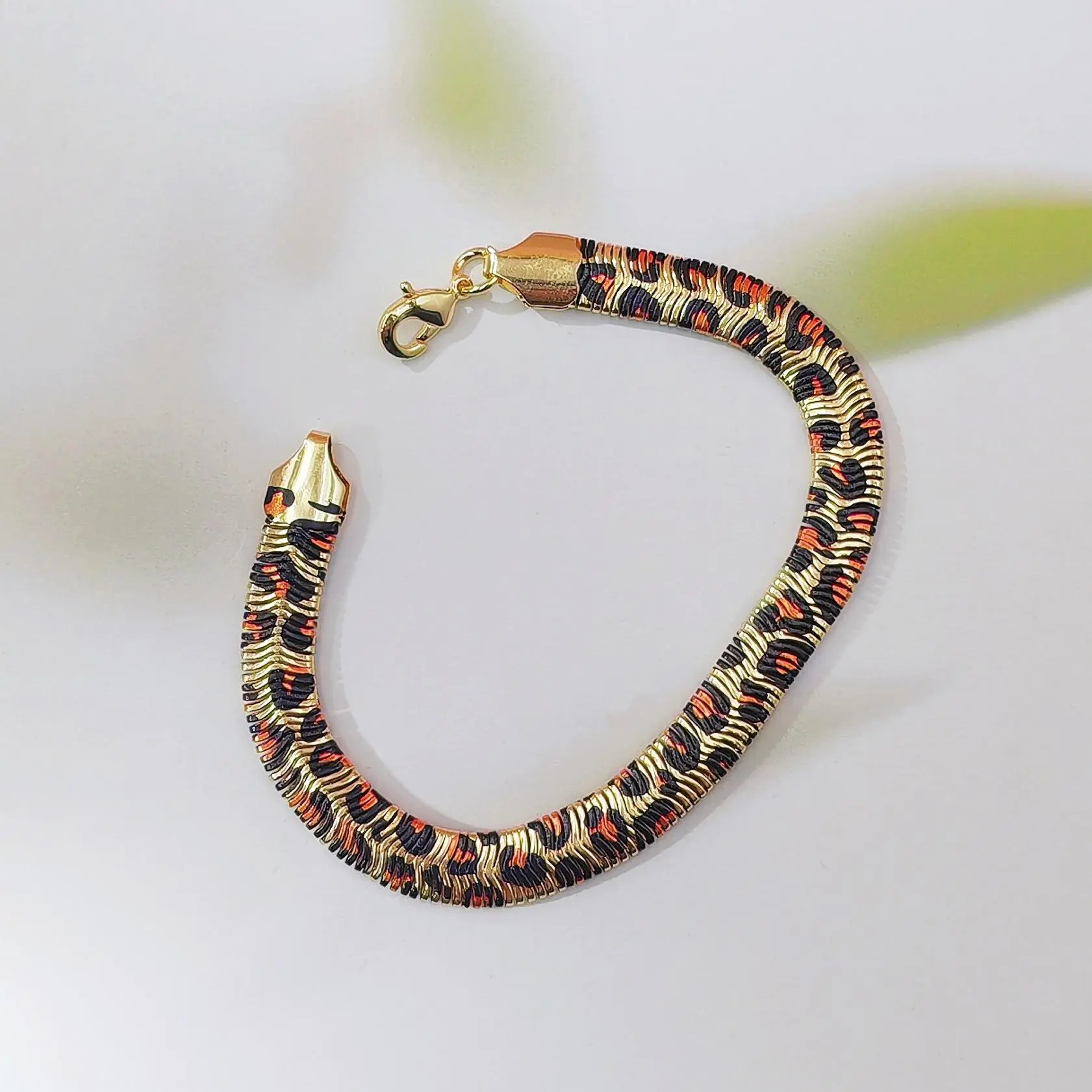 Large leopard print bracelet.