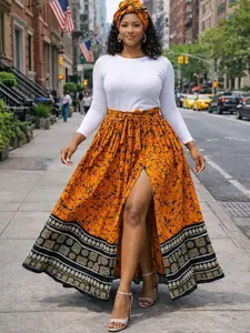 Orange African Print High-Waist Maxi Skirt with Front Slit and Waist Tie – Bold Ankara Statement Skirt