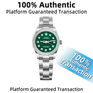Rolex Oyster Perpetual series 76080   Automatic movement   25MM  Green dial Stainless steel with aftermarket diamonds  Ladies' watch WHT016076