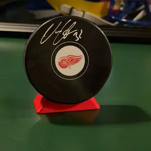 Hockey Puck and memorabilia  display stand