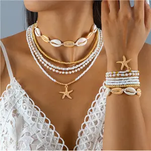 12Pcs Bohemian White Rice Beads Necklace & Bracelet Set - Vintage Ocean-Inspired Starfish & Shell Accents Golden Beads Necklace Multi-layer Women Beach Vacations Elastic Bangle Stackable Exquisite Golden Starfish Pendant Fashion Accessory