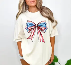 Comfort Colors Patriotic Bow T-Shirt - Large Watercolor Ribbon Bow With Red White And Blue Stars And Stripes, American Graphic For Women, Fourth Of July Tee, Independence Day Shirt, Feminine Coquette Style Cotton Fabric Top Womenswear Vintage Summer