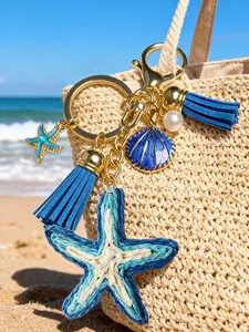 Ocean-Themed Keychain | Starfish & Seashell Tassel Key Fob | Vacation-Style Bag Charm | Hand-Woven Ombré Starfish Pendant | Metal Seashell & Pearl Keychain | Blue Tassel Ocean-Inspired Accessory | Ideal for Backpacks, Handbags, Car Keys, and Luggage | Per