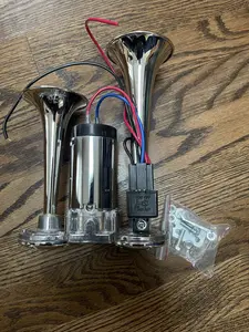 Powerful and loud double trumpet air horn, comes with compressor attached. Easy installation. Brand New