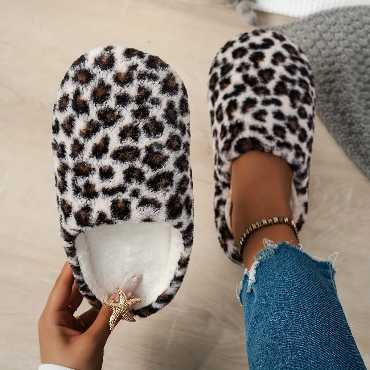 Cozy leopard - print plush slippers for stylish home comfort.