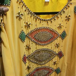 Beautiful Abaya Muslim Fashion with Embroidered Beads and Star Design in Vibrant Yellow