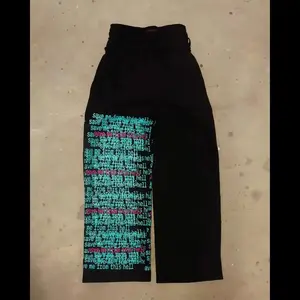 European and American outdoor street fashionletter printing double waist sweatpants designmen and women with the same hip-hop loosetrousers