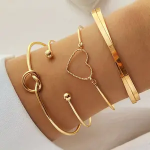 Golden Love Stack Bracelet Set”  “Minimal Chic Bangle Set”Golden Love Bangle SetChic Heart Bangle Collection