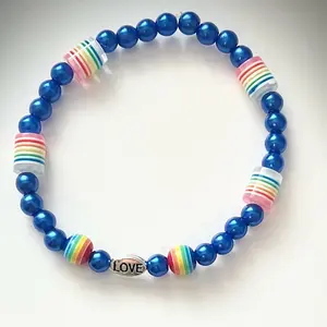 Love rainbow pride lgbt bracelet. Blue bracelet movement Kamala election