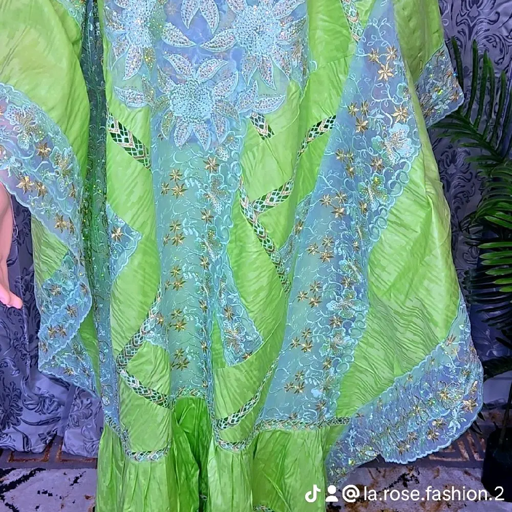Bazin Grand Bubu Dress in Lime Green with Intricate Embroidery and Flowing Fabric