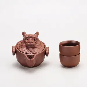 Handmade Purple Clay Teapot with Hand-Formed Design and Matching Tea Cups for a Unique Tea Set