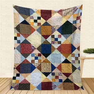 Vibrant Geometric Patchwork Quilt with Rich Multicolor Patterns and Textured Fabrics