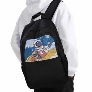 One Casual Backpack Featuring an Astronaut on a Rocket Print, Designed for Teenagers. It'S Lightweight with a Large Capacity, Adjustable Straps, Made of Black Nylon Fabric, And Has a Easy Cartoon Design. The Upper Part Has a Print