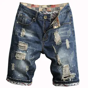 Grunge-Style Ripped Denim Shorts with Patchwork and Lining