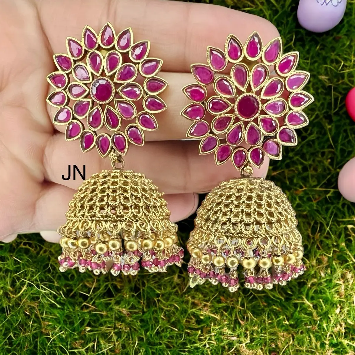 Gold polished Jhumka earrings