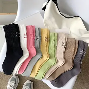 9 pairs of letter pattern socks, simple and comfortable tube socks, women's stockings and stockings