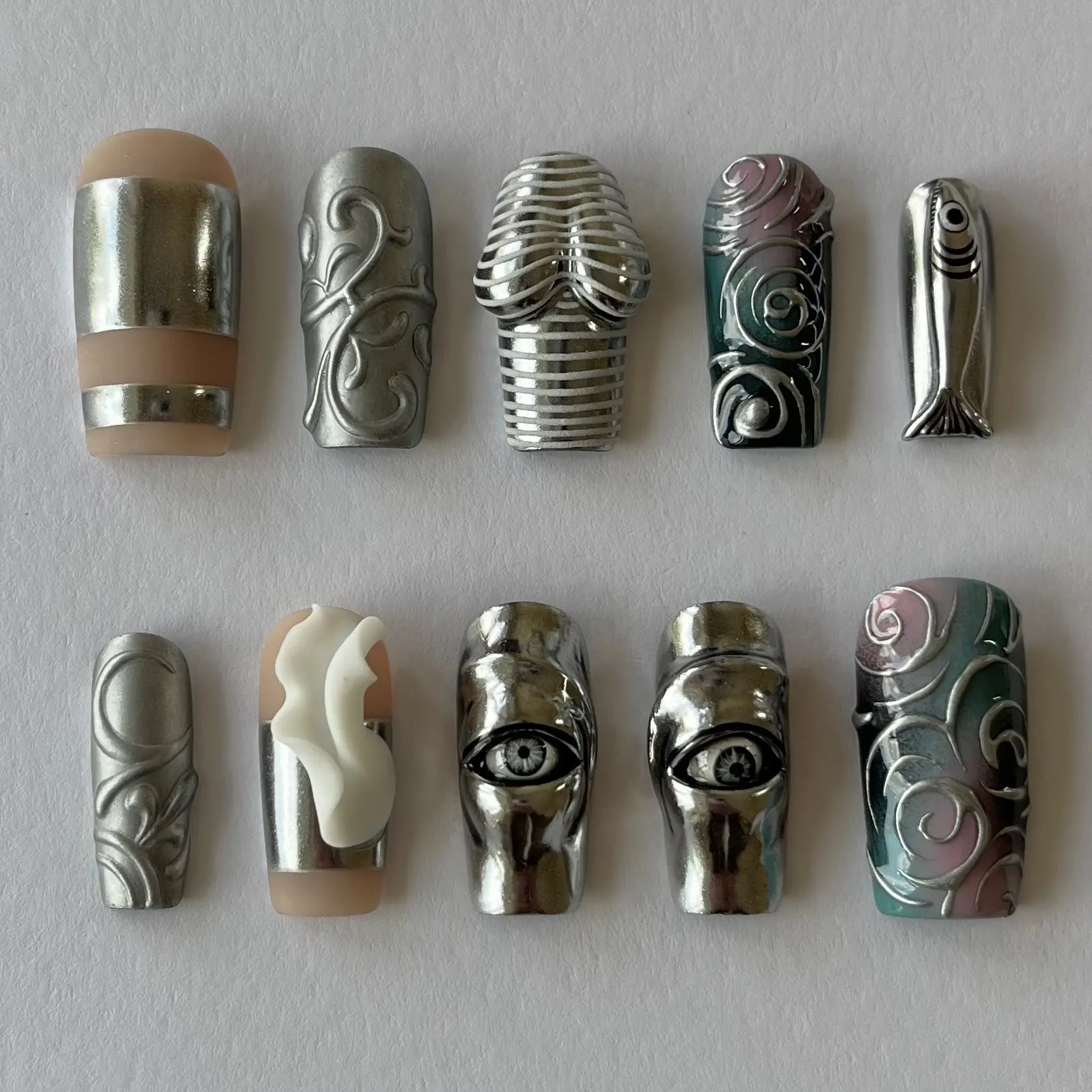 Y2K Futuristic Chrome Press On Nails, Silver Metallic 3D Eye Fish Heart Swirl Sculptural Long Square False Nail Set