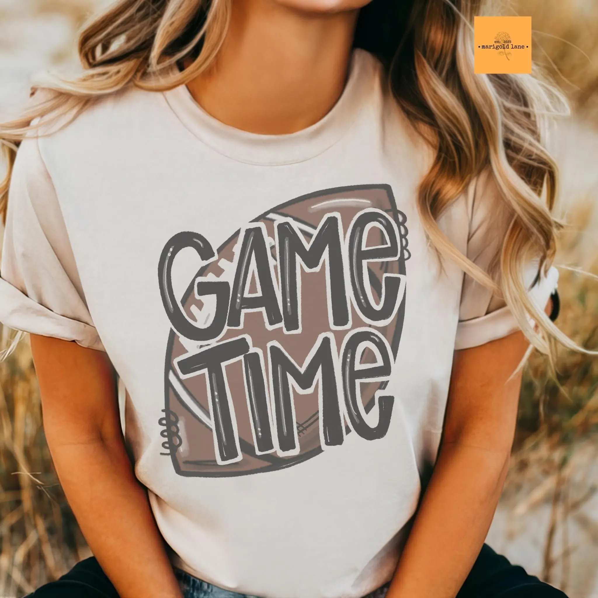 Football Game Time unisex graphic T-shirt with bold ‘Game Time’ football design, styled for game day, casual fall football T-shirt