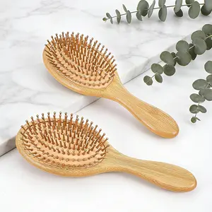 This natural bamboo paddle comb massages the scalp and is suitable for all hair types, including coarse, fine, curly, and dry hair.