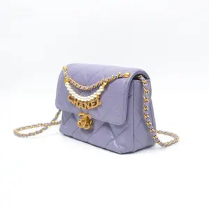 Pre-owned CHANEL Mini Classic Flap Bag, Lavender Purple Lambskin, Antique Gold Hardware with Pearl & Crystal Logo Decorative Chain, Spring Summer 2024(24P) Collection | Style hk