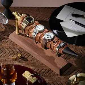 Watch stand in the shape of a horn made of resin and walnut wood.