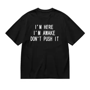 Women's fashion T-shirt with the slogan "I'm here, I'm awake, don't push me." Men's casual hoodie with a kangaroo pocket, suitable for all seasons.