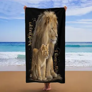 Heartwarming scene of adult lions and cubs; the multi-functional use of beach towels and beach towels.