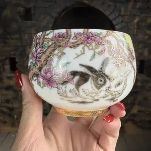 Handmade tea cup with powder color, gold painted jade rabbit flower pattern, sheep fat jade porcelain