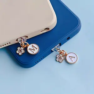 A New Cute Flower And Letter Phone Dust Plug, Featuring Charming White Cherry Blossoms And A-Z Initial Phone Port Dust Covers, Suitable for Phone Decoration, Compatible with Iphone And Type-C Ports, Perfect for Holiday Party Gifts
