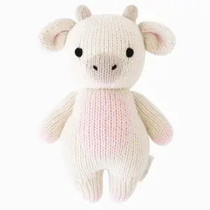 cuddle+kind Baby cow (strawberry) 7" hand-knit doll - gives 5 meals, fair trade, heirloom quality, 100% cotton yarn