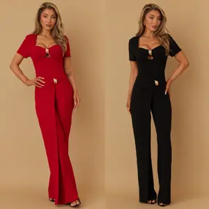 - SHORT SLEEVE JUMPSUIT - COIL RING STUD DETAIL - FLARE FLAP DETAIL WAIST DOWN - ZIPPER ON THE BACK