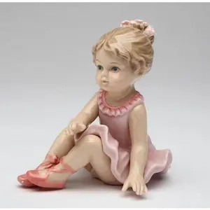 Porcelain Ballerina with Ballet Slippers Warming Up Figurine