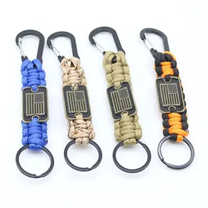 4Pcs Handmade 7-Core Braided Paracord Keychain with Flag Tag Durable Polyester Sporty Keychain for Men with Black and Golden Accents Stylish Accessory for Keys Backpacks and Outdoor Gear