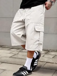 Men’s cargo shorts made from a sturdy, wear-resistant fabric featuring a large side pocket design, a drawstring elastic waistband, and a vintage workwear aesthetic—ideal for everyday outings and casual commuting.