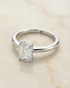 The Floria Solitaire Engagement Ring Setting for Emerald Cut Diamonds in Platinum