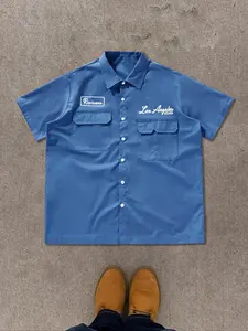 Men's Letter & Star Print Pocket Short Sleeve Shirt, Loose Casual Graphic Button Design Top for All Seasons, Fashion Men's Clothes for Daily Wear, Tropical