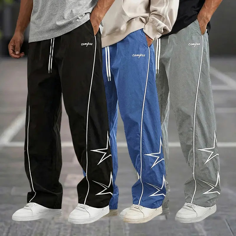 Men’s three-pack fashion casual athletic sweatpants with side stripes and star design; American high-street style loose straight-leg drawstring joggers for everyday outdoor commuting sports/fitness training. Pocket Esports Trouser outfit men Baggy Pants,