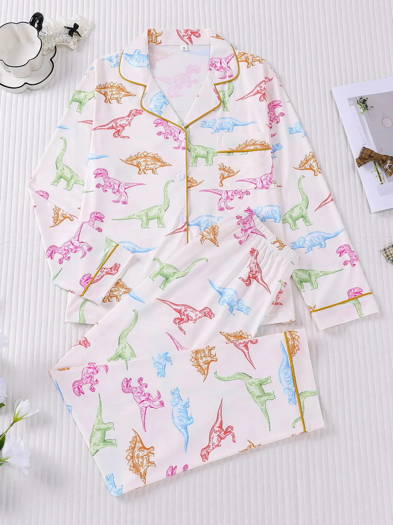 2-piece women's set featuring T-Rex, giraffe, stegosaurus, and triceratops patterns with long-sleeve top and long pants, small pocket, button closure, elastic waistband, soft and comfortable, skin-friendly, smooth, suitable for all seasons, casual home we
