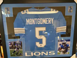 David Montgomery 43.5 x 35.5 autographed framed custom jersey. Jersey Auto Beckett Certified.