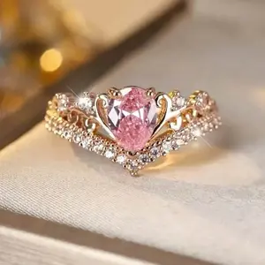 Women's Elegant Rose Gold Pink Crown Ring with Cubic Zirconia Embellishment Perfect for Weddings and Everyday Charm