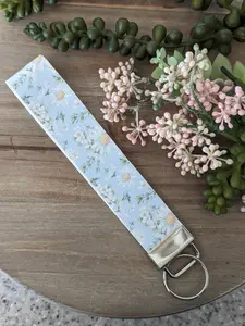 Daisy Faux Leather Wristlet