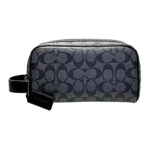 COACH Travel Kit 22 in Classic Monogram with PVC, Canvas, and Leather for Men and Women as a Small Travel, Toiletry, or Makeup Bag in Black
