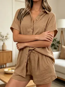 Two piece set of women's fashionable short sleeved shirt+drawstring shorts, with a pleated texture design, suitable for summer, commuting to work, shopping and outdoor wear