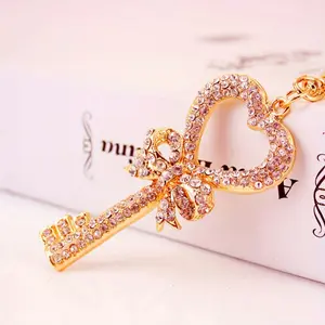 Heart-shaped bow keychain with rhinestone pendant - durable zinc alloy lobster clasp, sparkling pink and white design, the perfect Valentine's Day gift for both men and women.